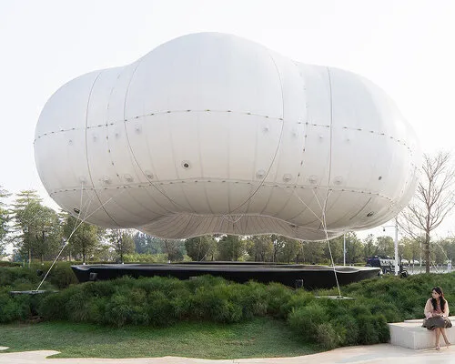 Ephemeral Grandeur: Kinetic Clouds Transform Urban Commercial Landscapes