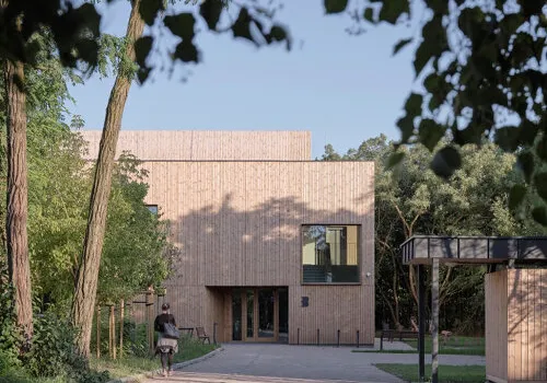 Ambient Architects' Warsaw Library: A Natural Poem of Washed Timber & Flexible Spaces